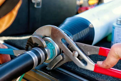 Pipe repair service using professional plumbing tools in Woodstock, Georgia