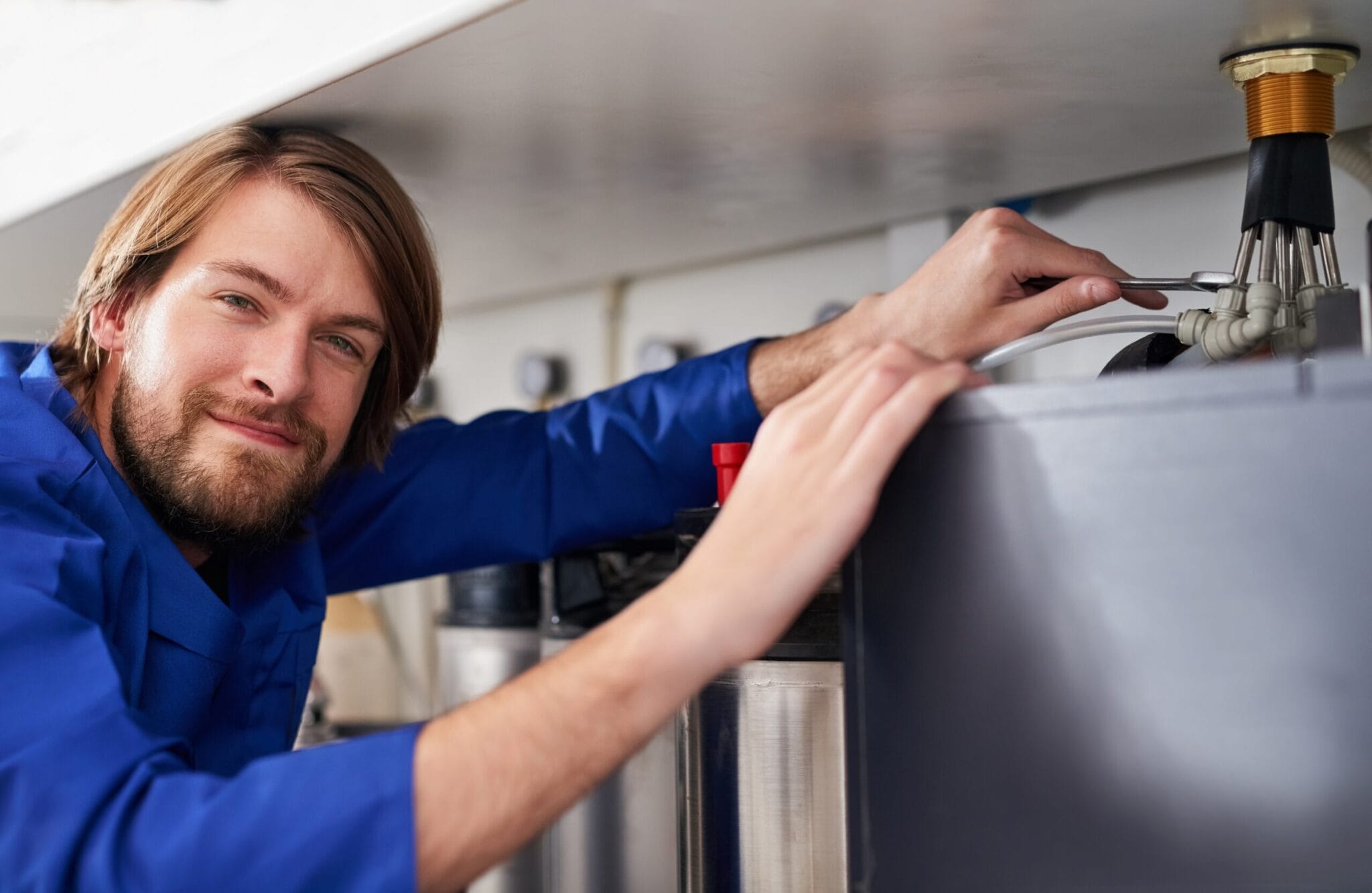 Appliance water line repair by plumber in Woodstock, Georgia