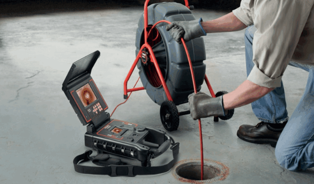 Technician performing a sewer camera inspection in Woodstock